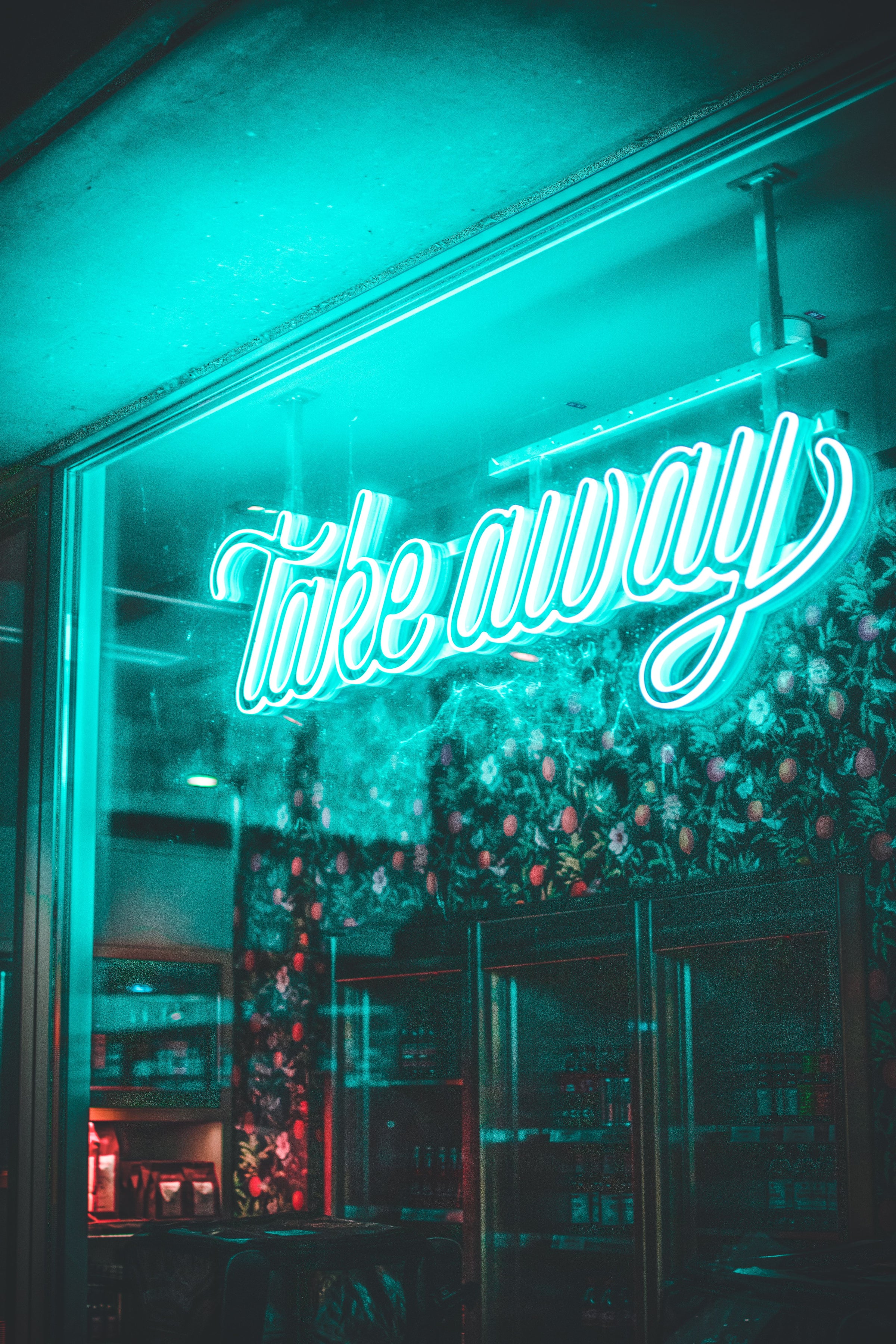 The Jungle custom LED neon logo installed inside a storefront window