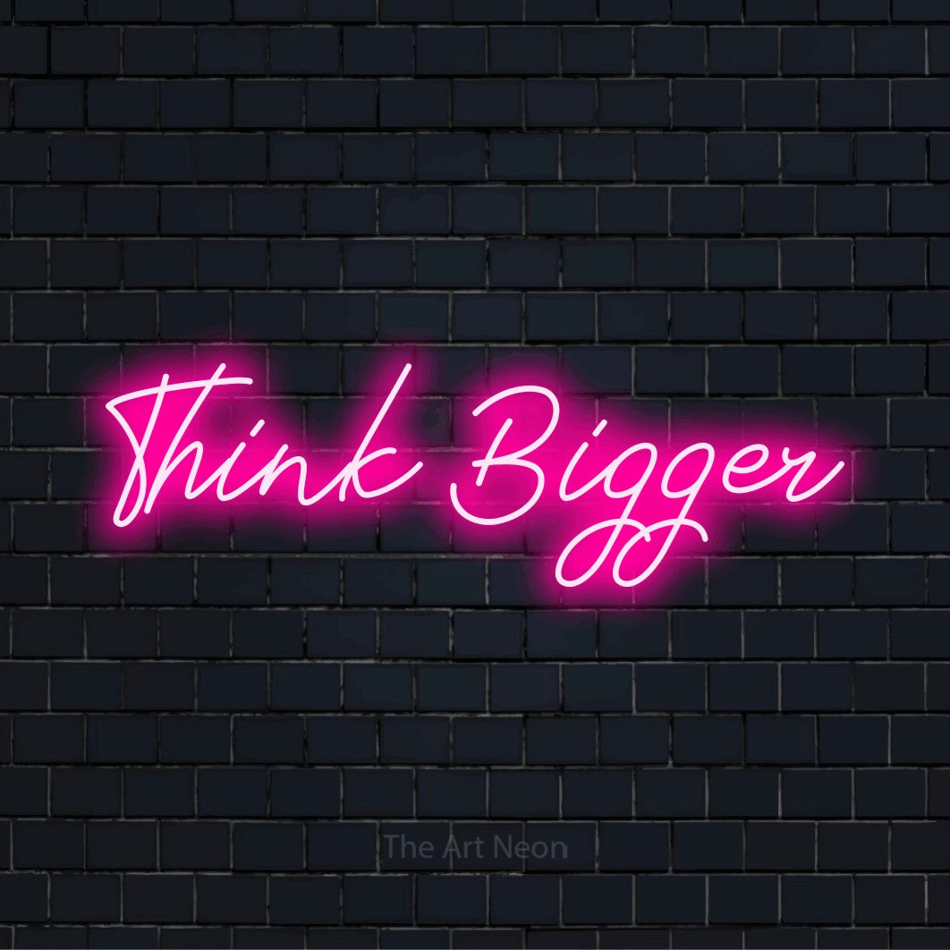 "Think Bigger" text design with neon effect on a black brick wall