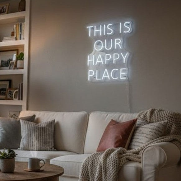 White This Is Our Happy Place LED neon sign in a furnished living room