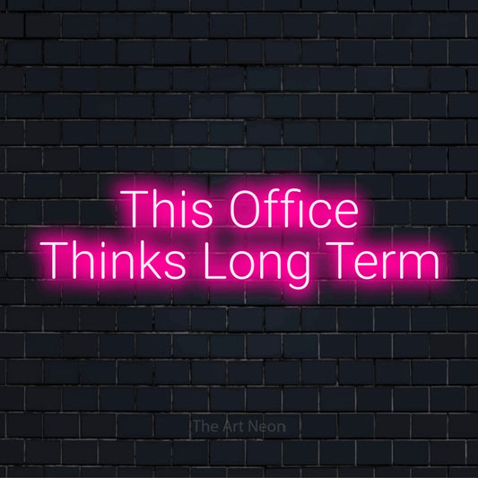 "This Office Thinks Long Term" text design with neon effect on a black brick wall