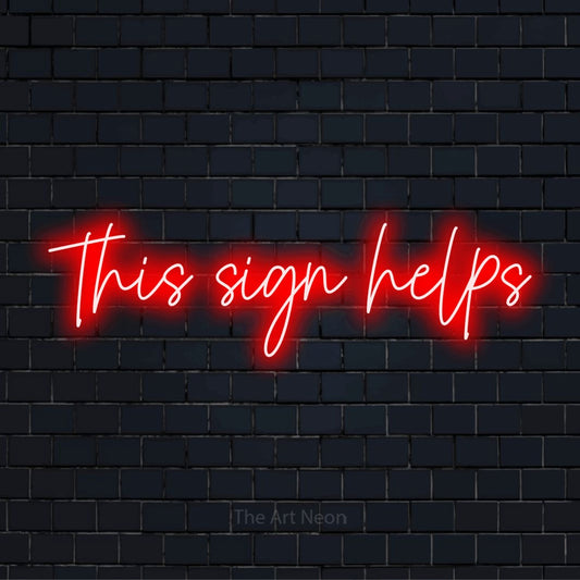 "This Sign Helps" text design with neon effect on a black brick wall