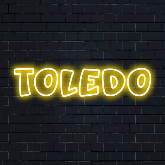 Toledo Neon Sign, glowing wall decor on black brick background