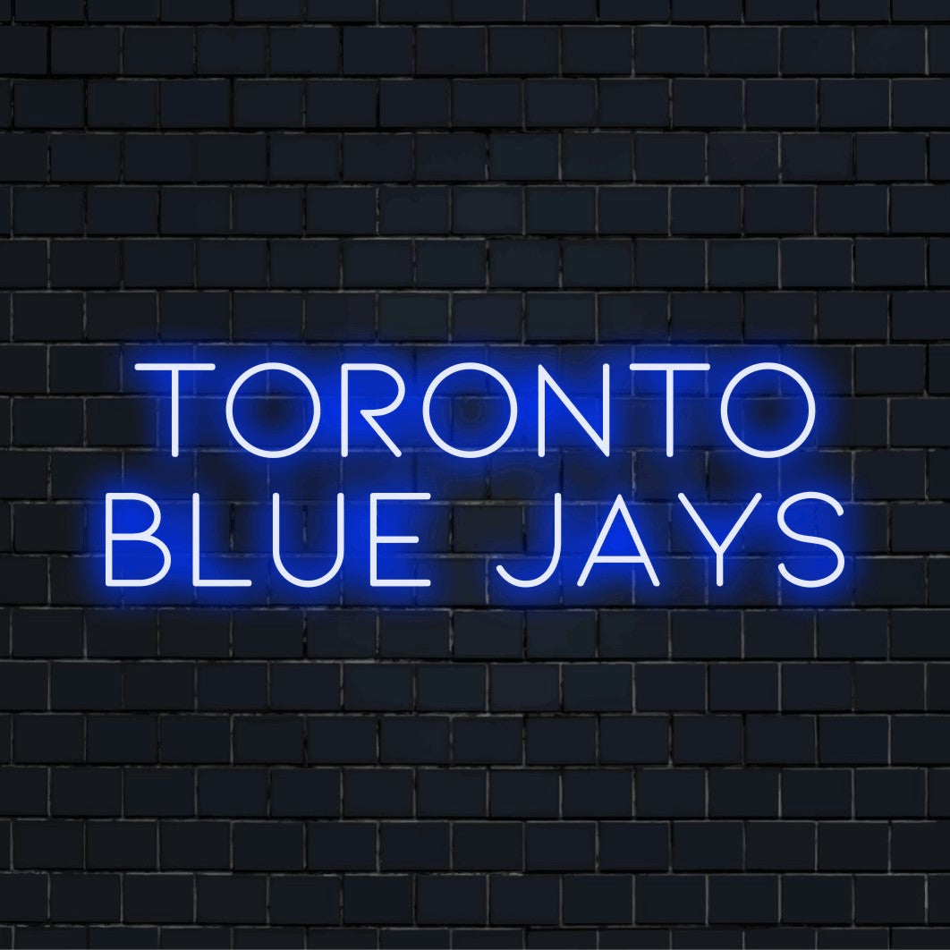 Toronto Blue Jays LED Neon Sign, bright neon lettering on dark brick wall