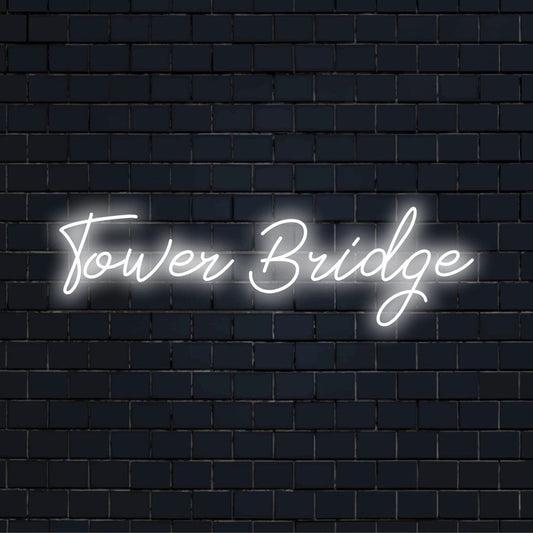 Tower Bridge Neon Sign, soft neon glow against brick backdrop