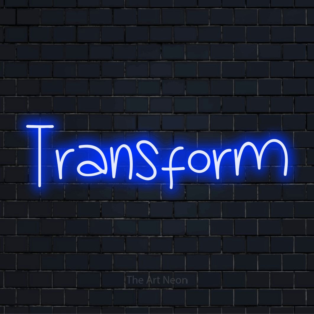 "Transform" text design with neon effect on a black brick wall