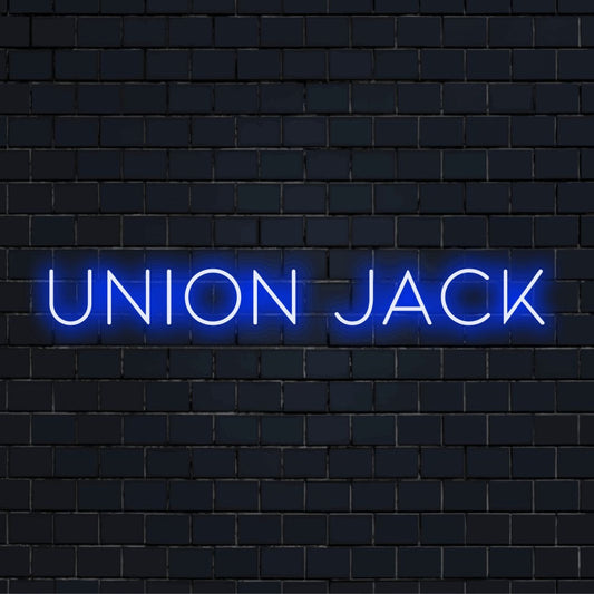 Union Jack Neon Light with glowing neon text against brick backdrop