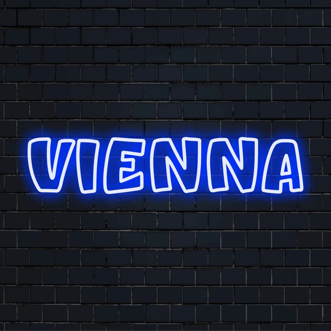 Vienna Neon Sign, neon text light against black brick wall