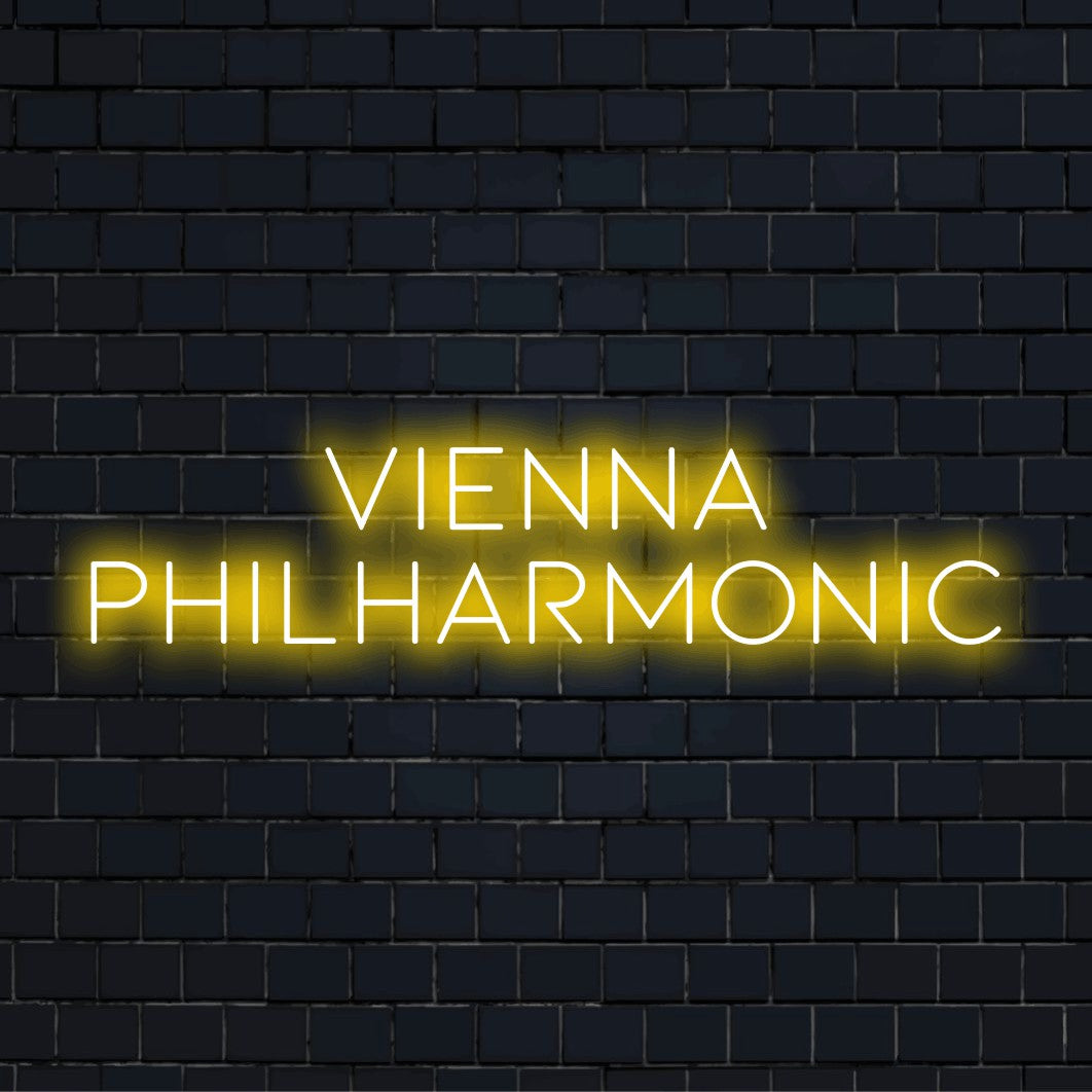 Vienna Philharmonic LED Neon Sign, glowing wall decor against black brick wall