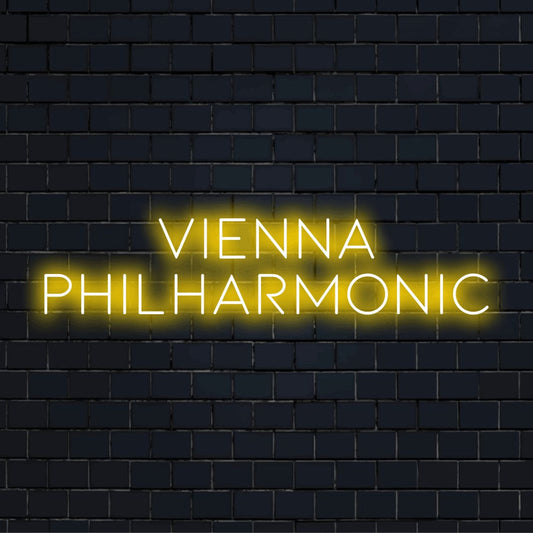 Vienna Philharmonic LED Neon Sign, glowing wall decor against black brick wall