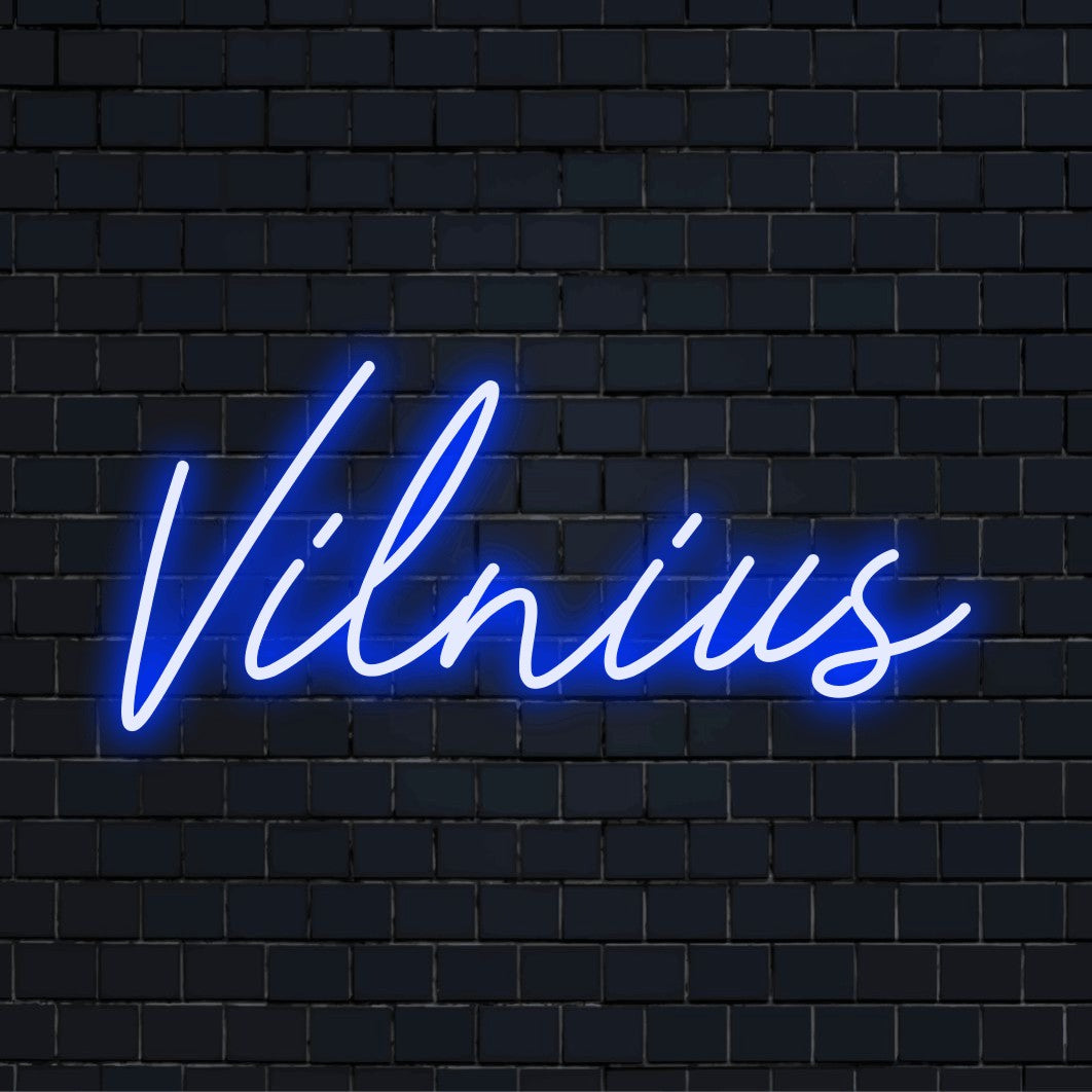 Vilnius LED Neon Sign, glowing neon text against black brick wall