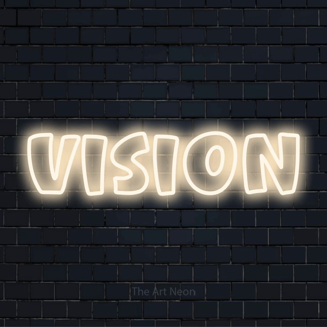 "Vision" script-style LED neon sign on a black brick wall