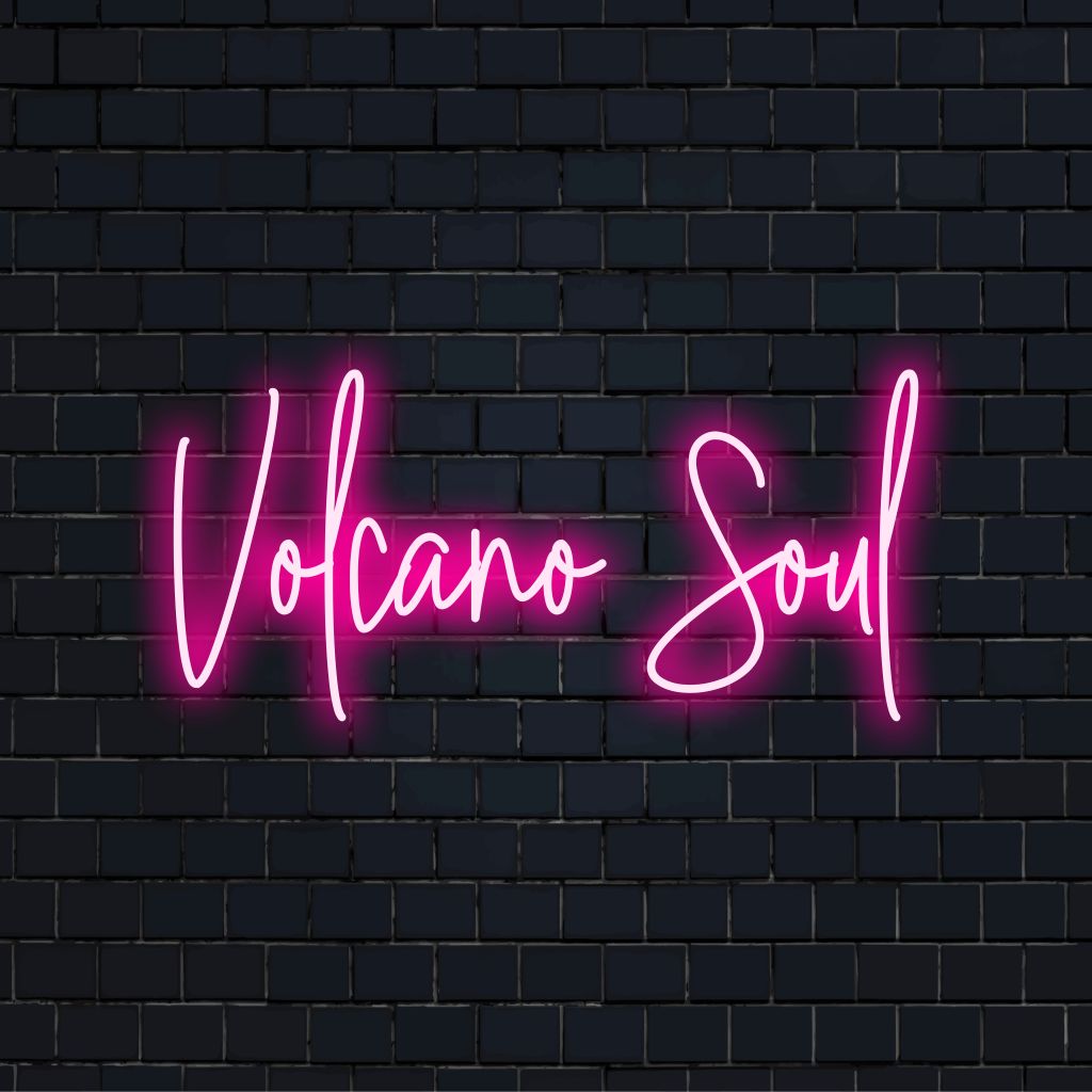 Volcano Soul LED Neon Sign, bright LED glow against black brick wall