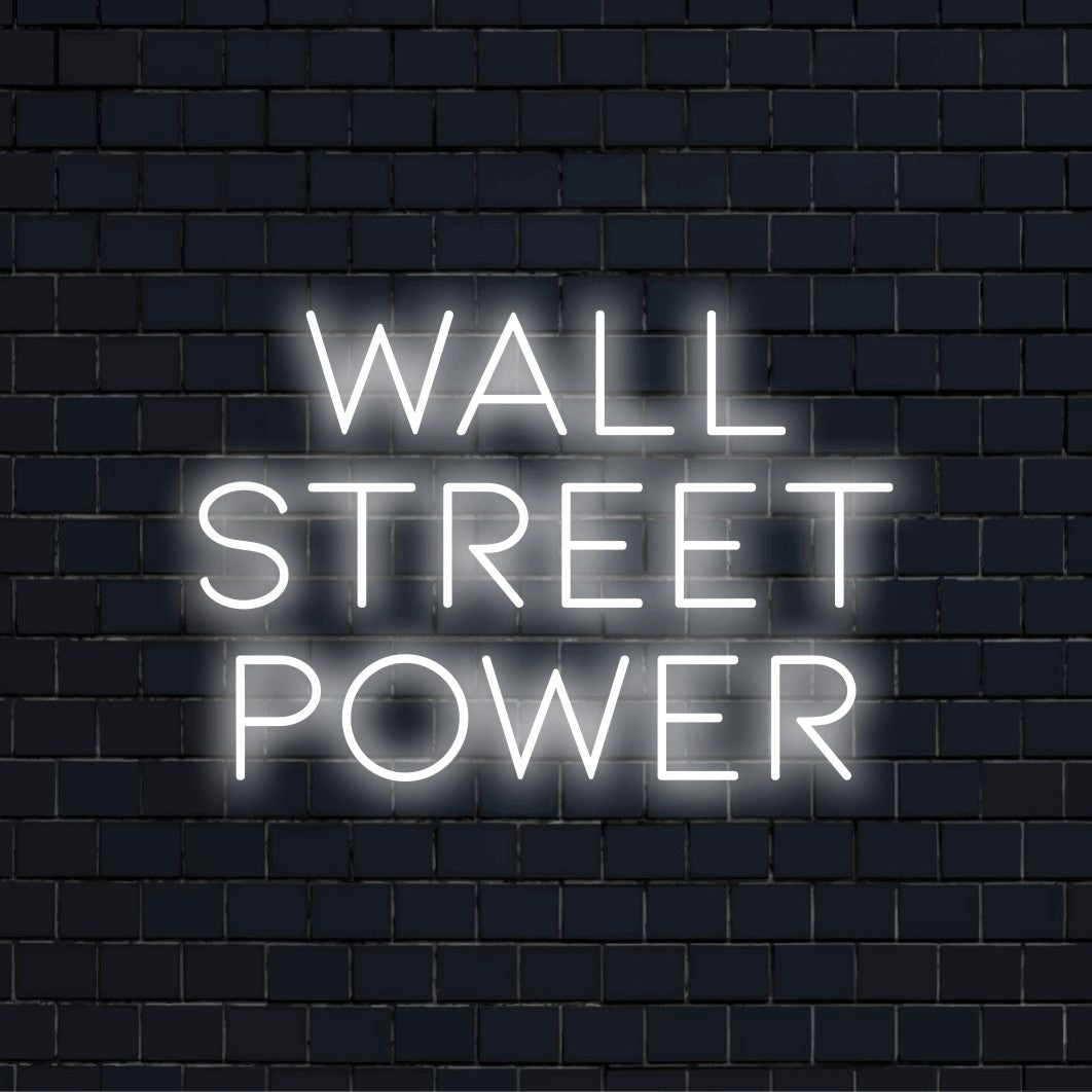 Wall Street Power LED Neon Sign, glowing lettering against black brick wall