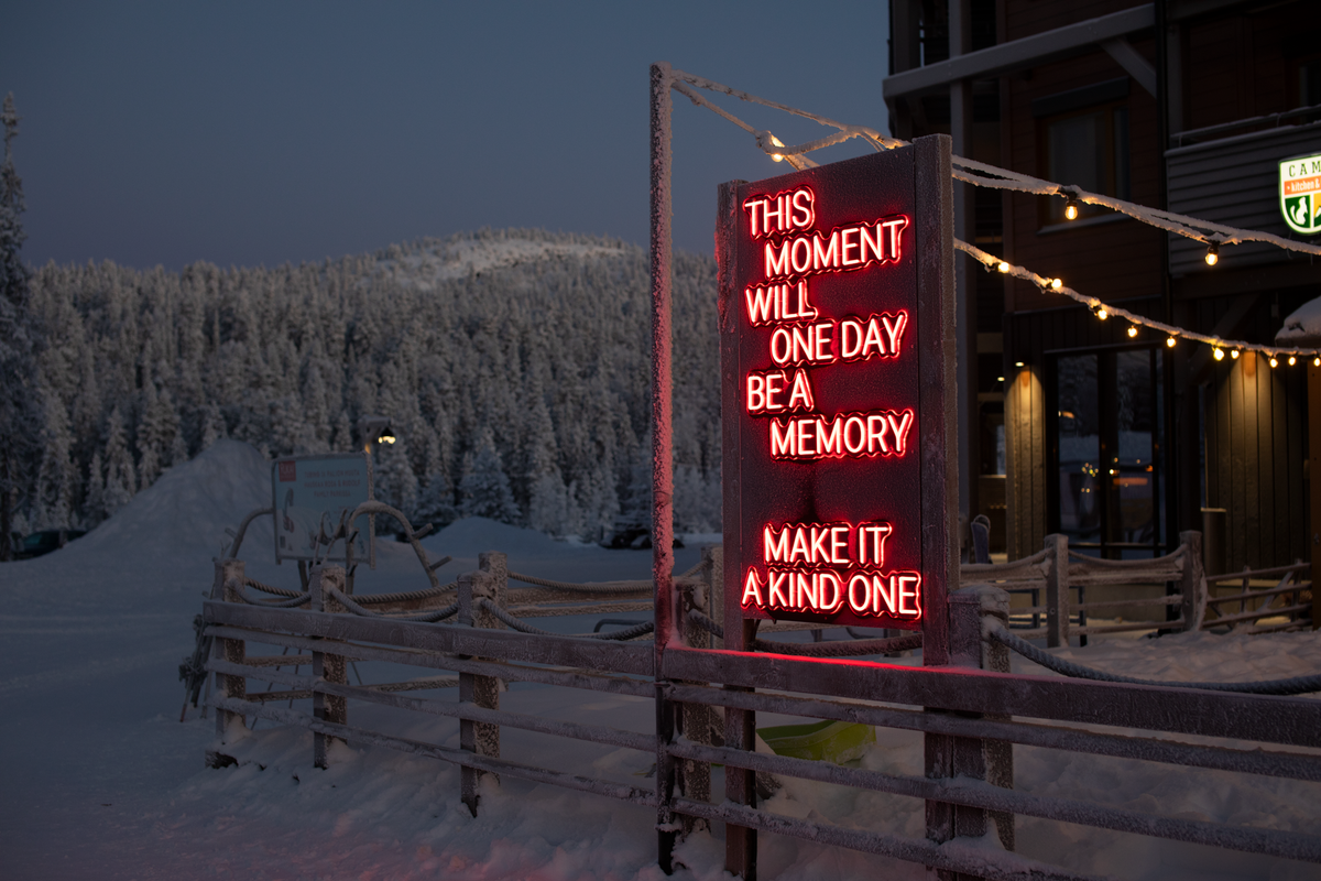 Outdoor LED neon text installation at Ruka Polar Night Light Festival in Finland