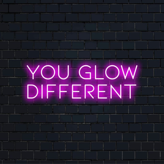 You Glow Different LED Neon Sign, bright LED glow against black brick wall