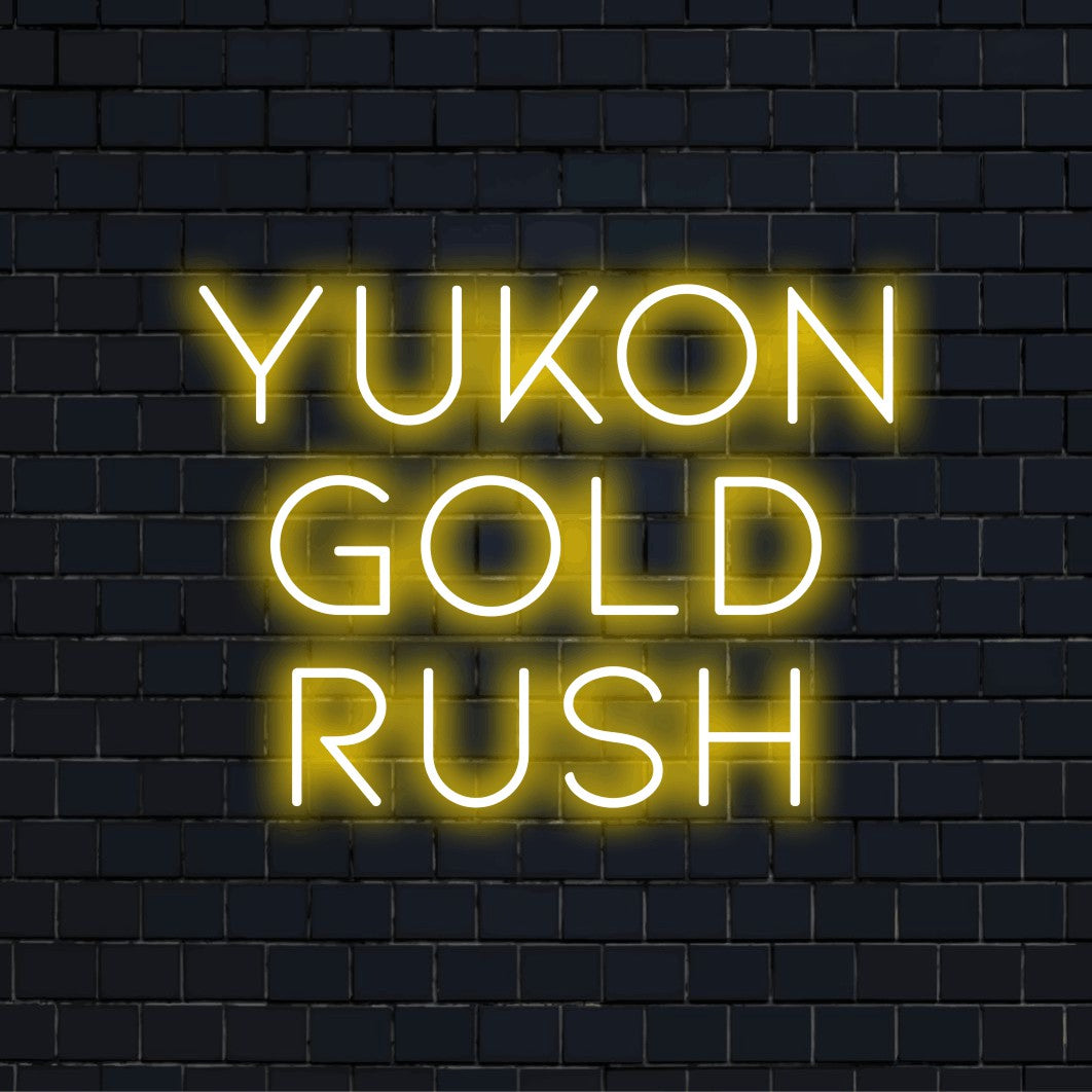 Yukon Gold Rush Neon Sign, bright neon glow on dark brick background